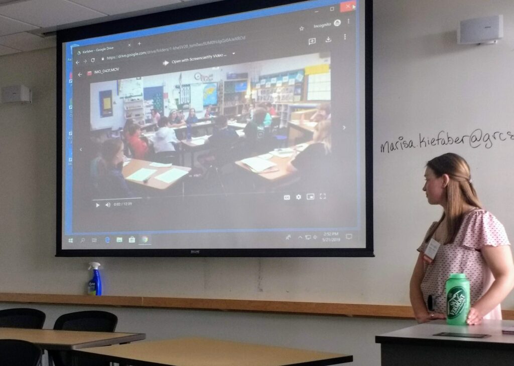 woman is giving a presentation