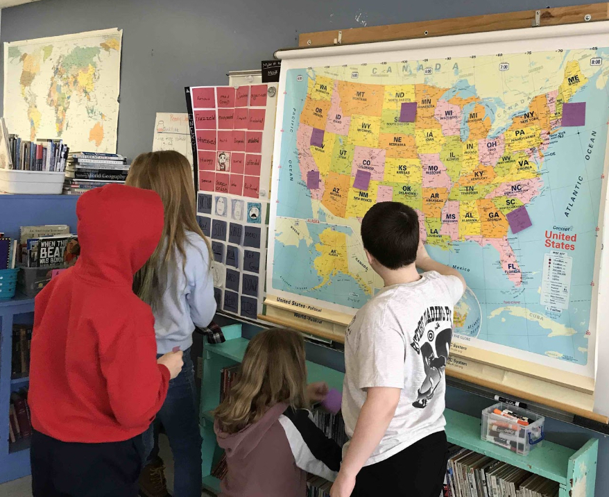 Alpha 5 students check out which states are available to choose from as they decide on the topic for their podcast.