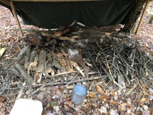 An unlit fire in the wilderness