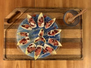 Endive cups with chevre, grapefruit, pomegranate, pecans, olive oil, and sherry vinegar
