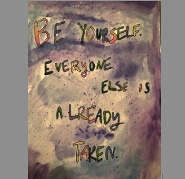 A messy painting in shades of plum and mauve, with scrawled text: "Be yourself. Everyone else is already taken."