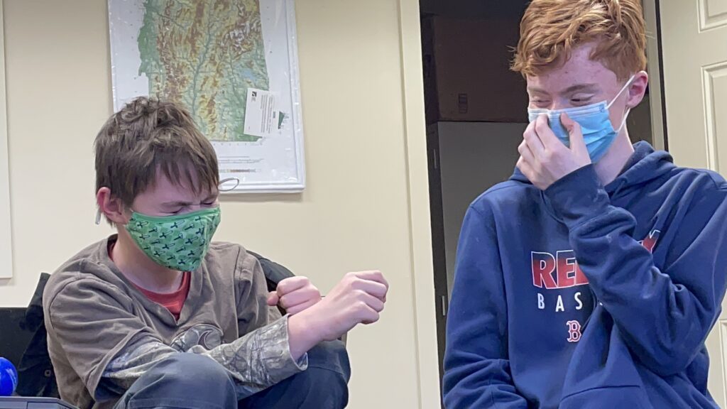 Two students wearing cloth masks