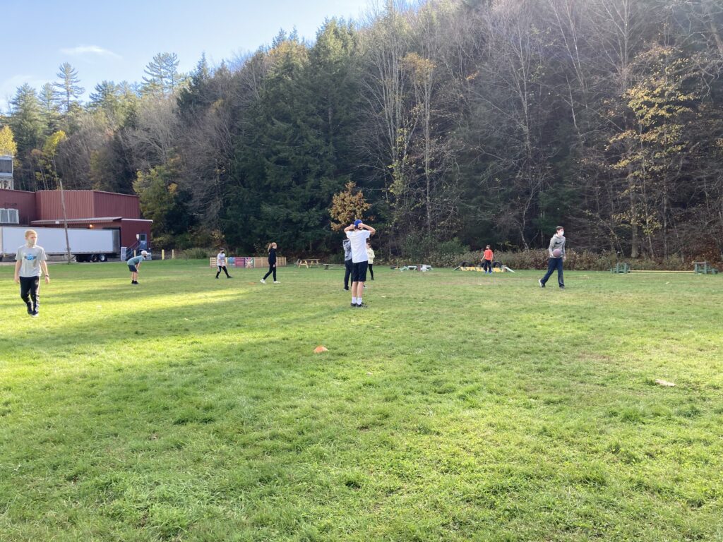 Students standing in a field