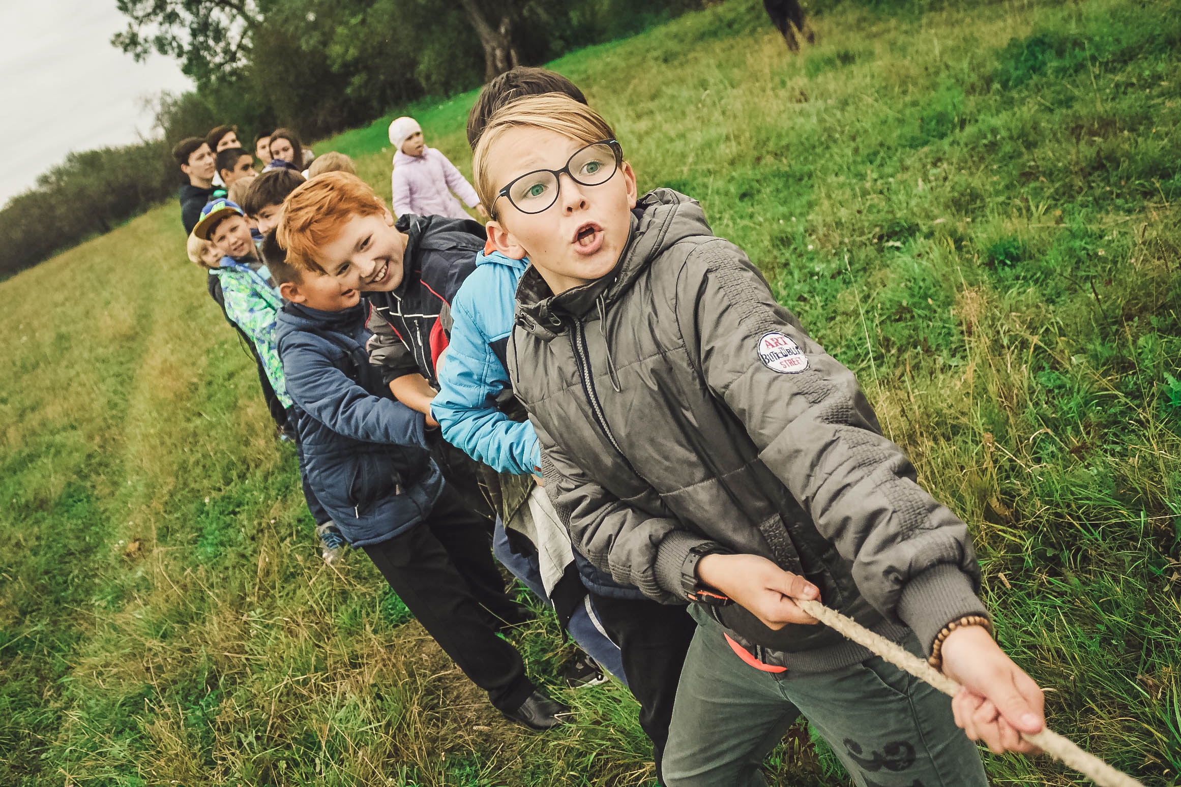 Middle school students play tug-of-war