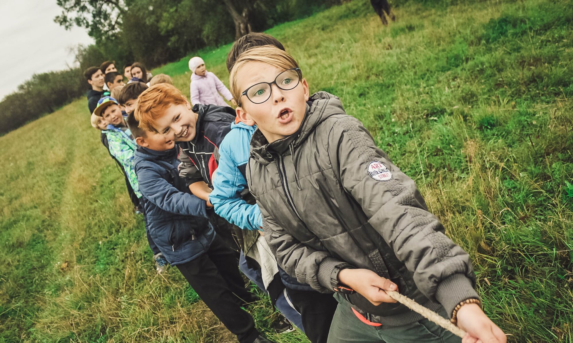 Middle school students play tug-of-war